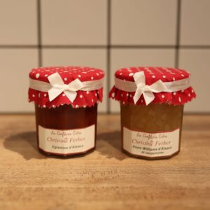 2 pots de confiture avec un nœud en ruban de satin acétate 