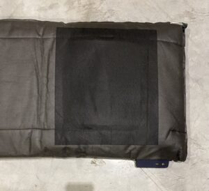 Dessous coussin terrasse